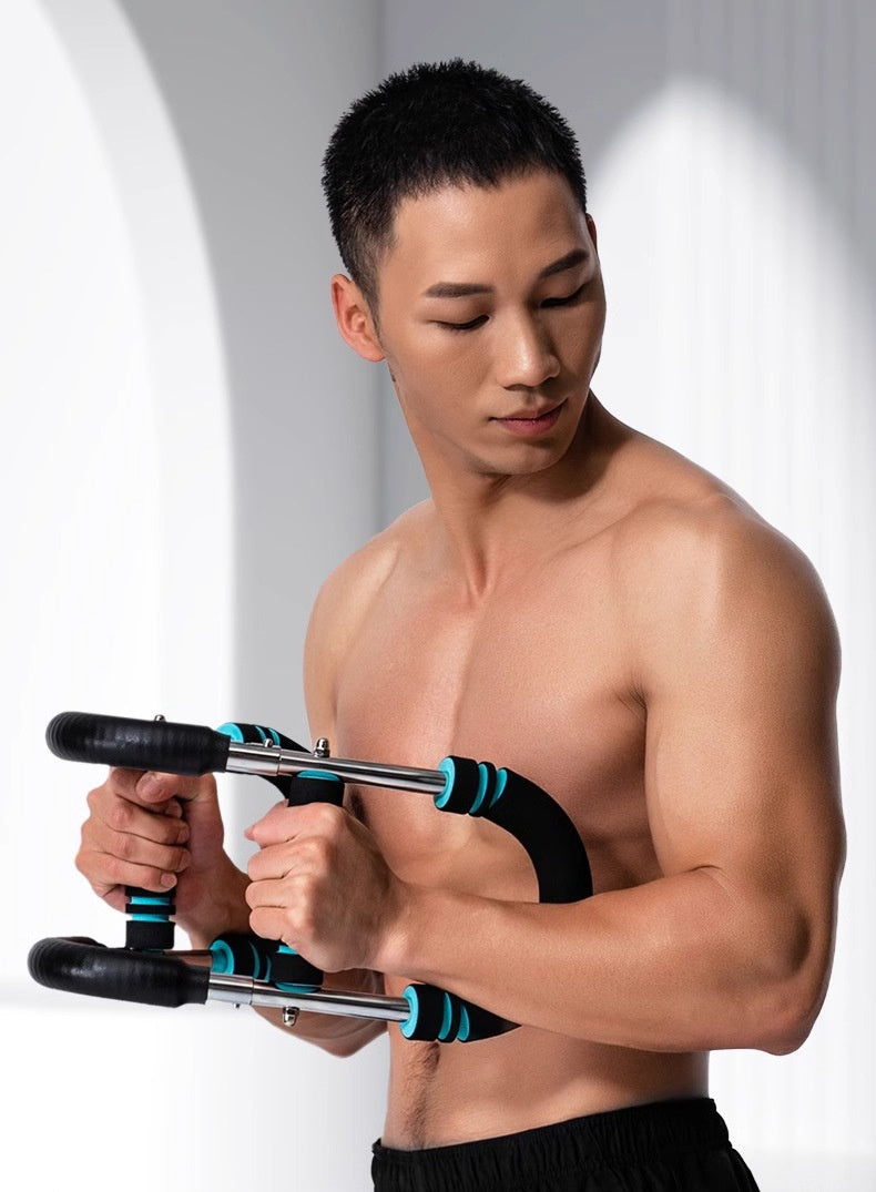 Man training with a U-shaped chest exerciser