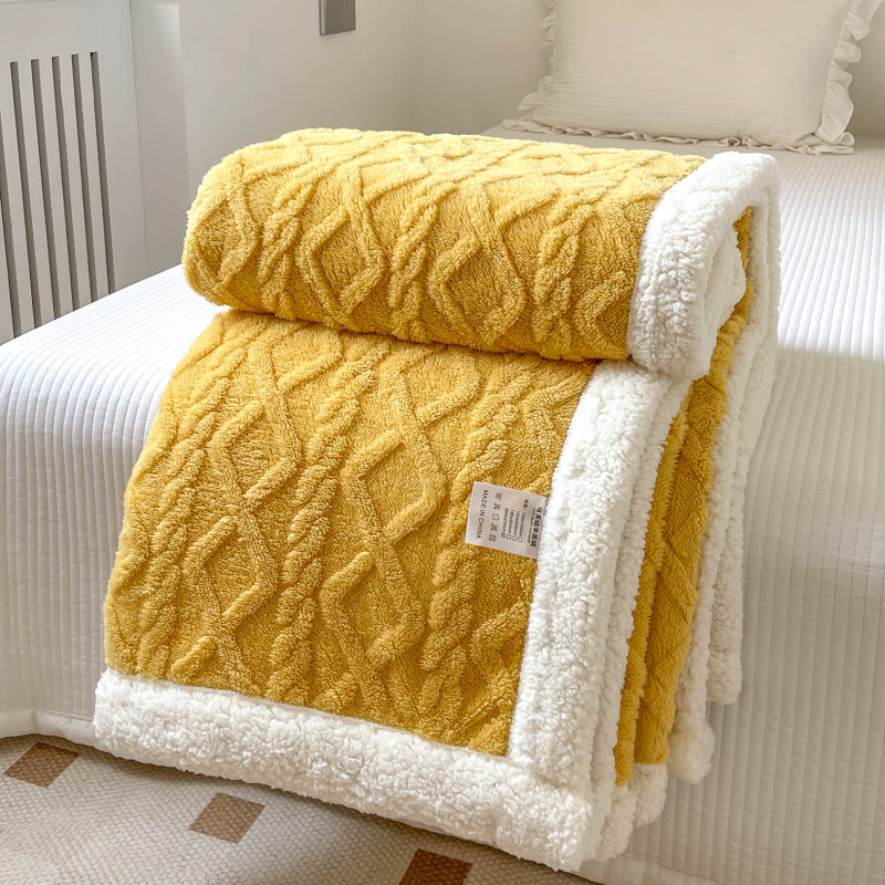 Cable-knit jacquard blanket with sherpa border
