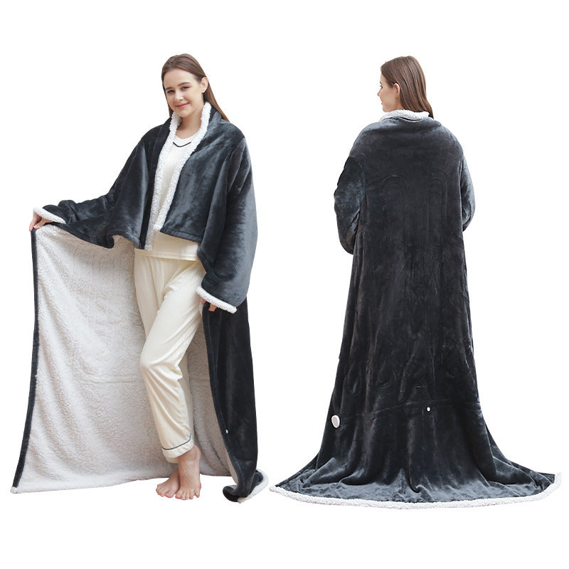 Person wearing sleeved electric heated blanket