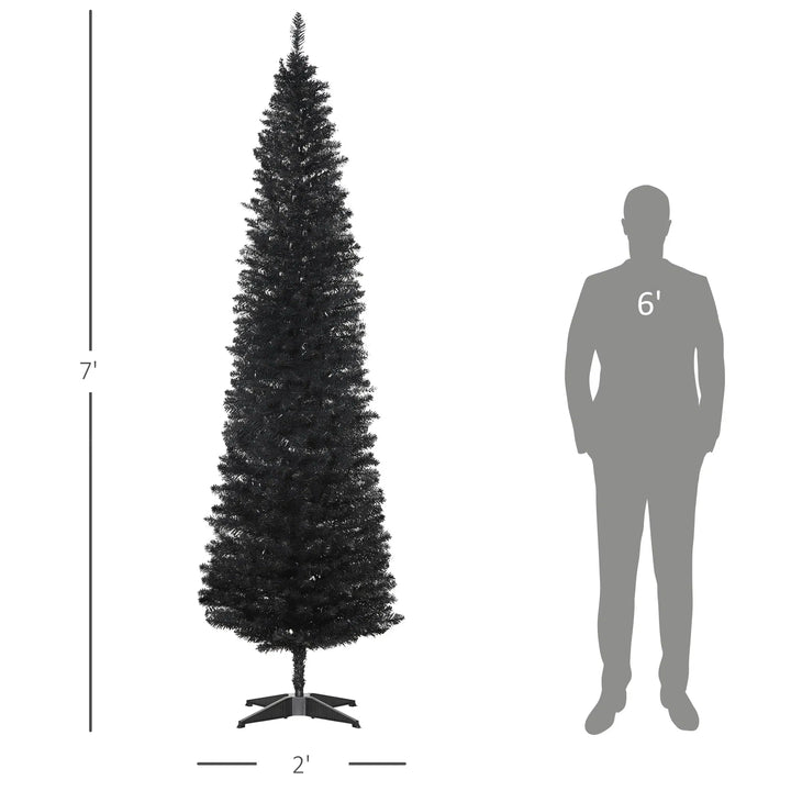 Slim black pencil Christmas tree in a living room