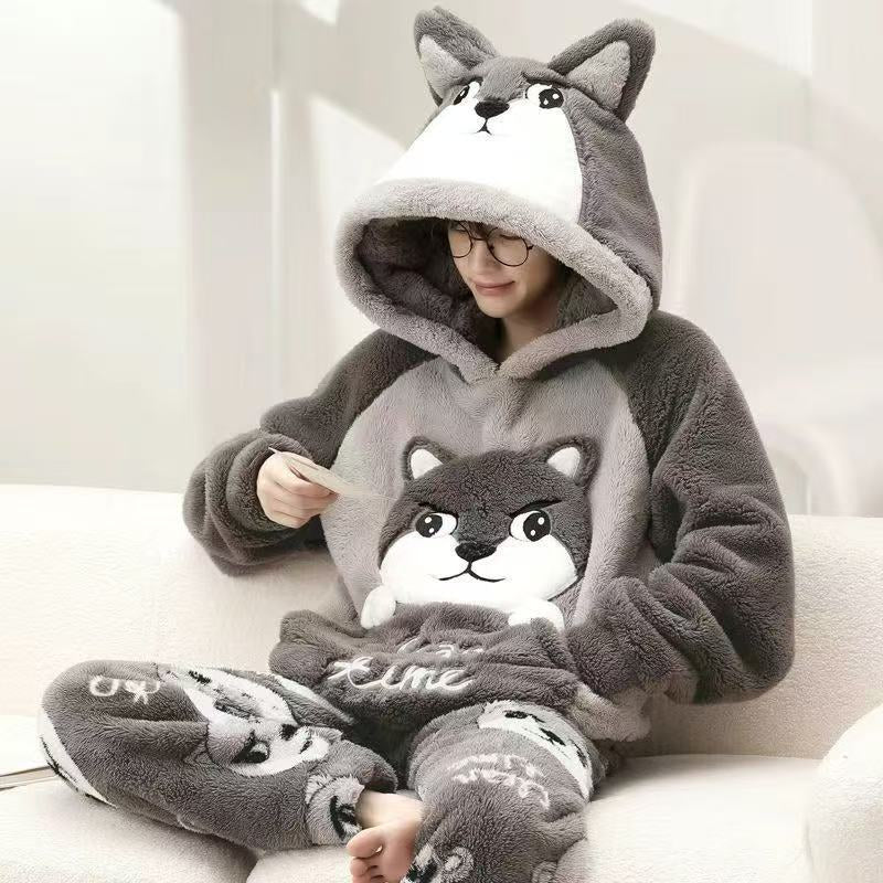 Man in a husky coral fleece hooded pajama set