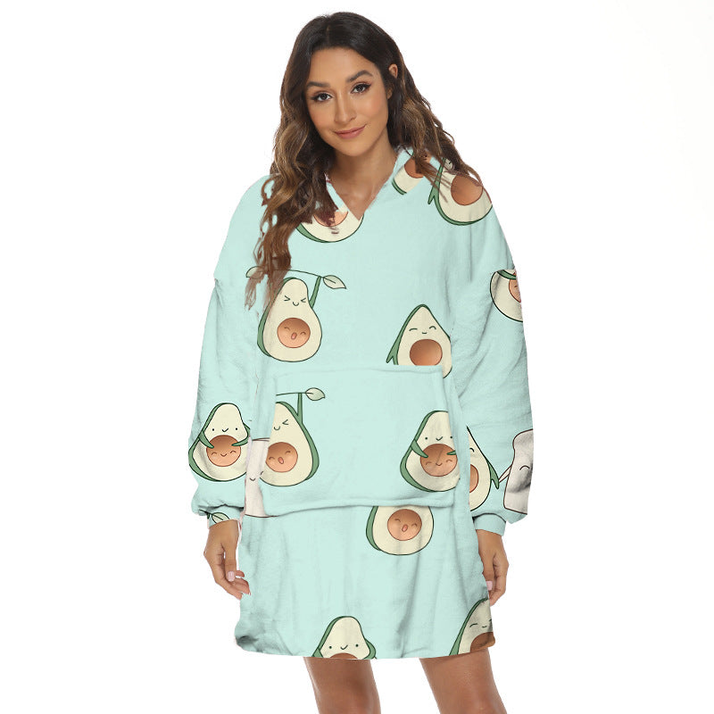 Person wearing oversized hooded blanket