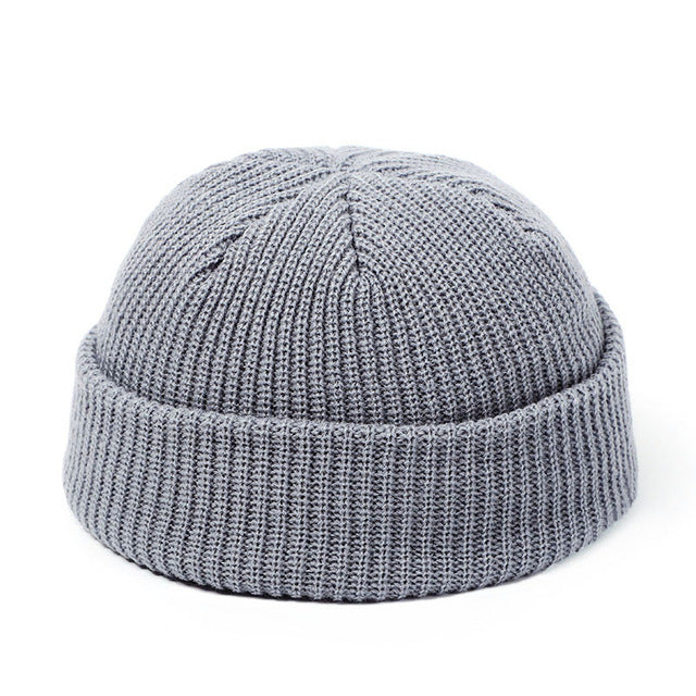 Short ribbed fisherman beanie with turn-up cuff