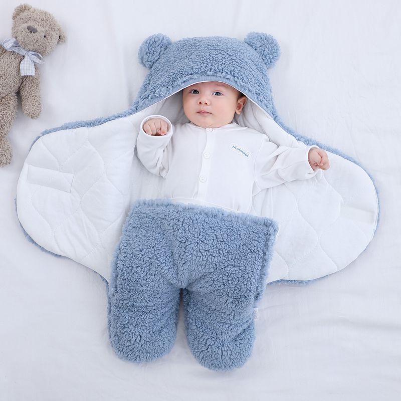 Baby in a bear ear sleep sack