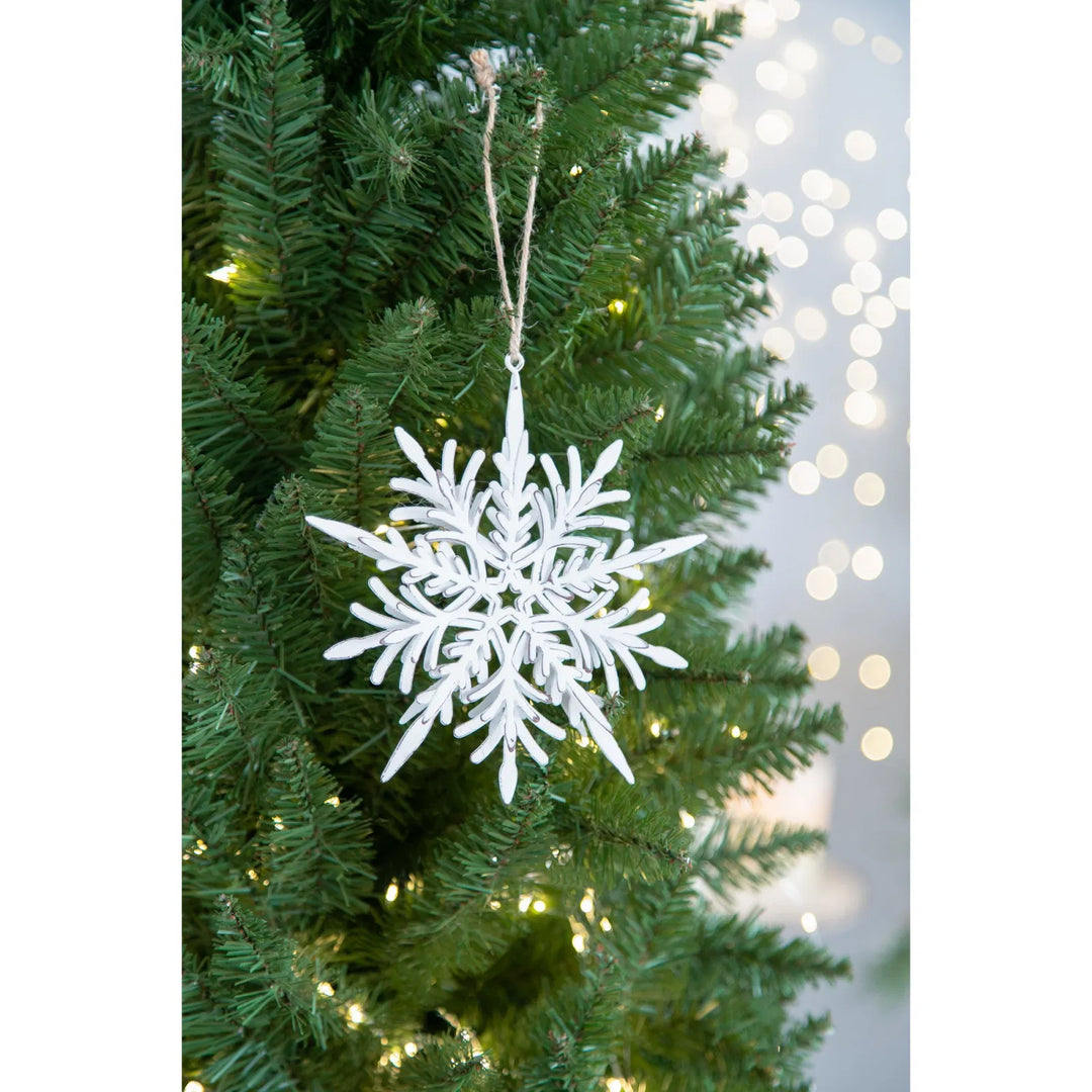 White iron snowflake ornaments with rope hangers