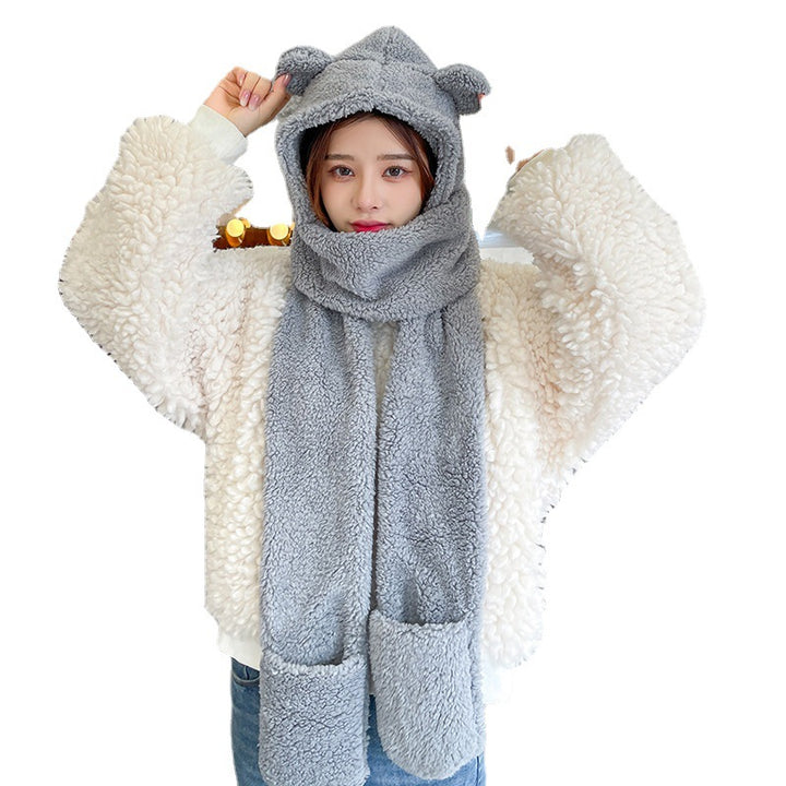 Woman wearing a teddy hood with bear ears