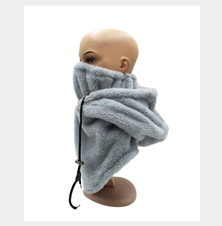 Woman wearing a plush hooded scarf