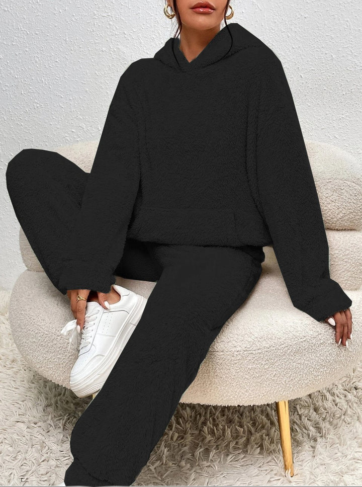 Woman in a fuzzy hoodie lounge set