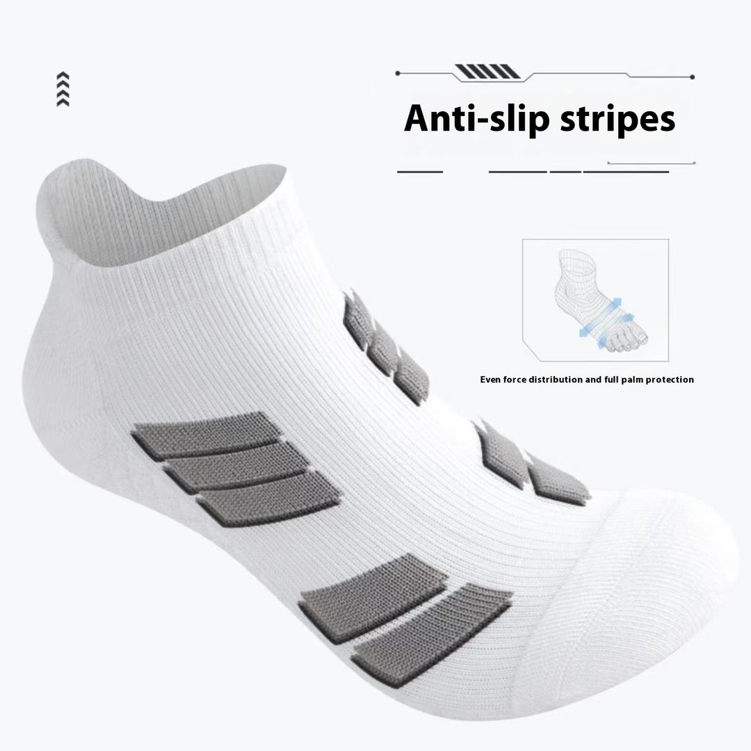 Stack of white low-cut cotton ankle socks