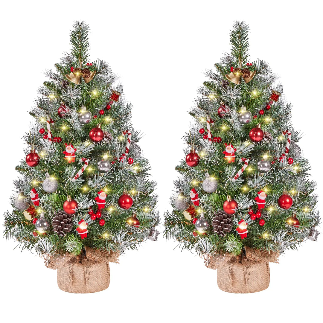 Two frosted tabletop trees with lights