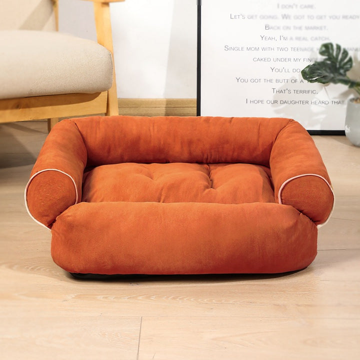 Plush sofa-style pet bed with bolsters