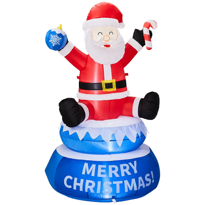 Inflatable lighted Santa on a rotating Merry Christmas base