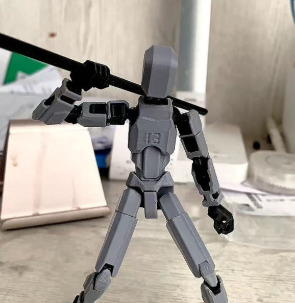Orange poseable 3D printed robot figure