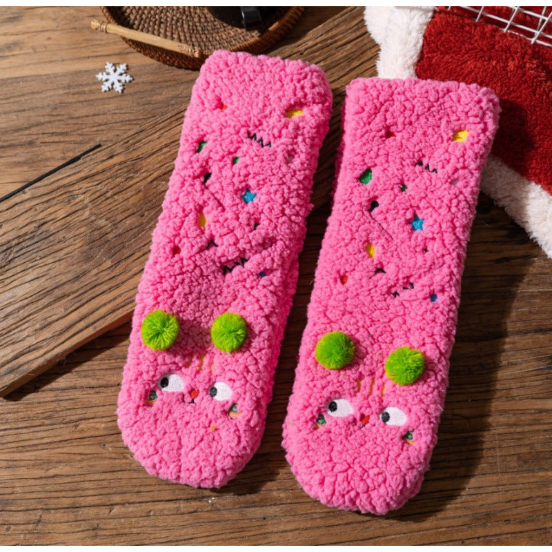 Fluffy pink floor socks with embroidered faces