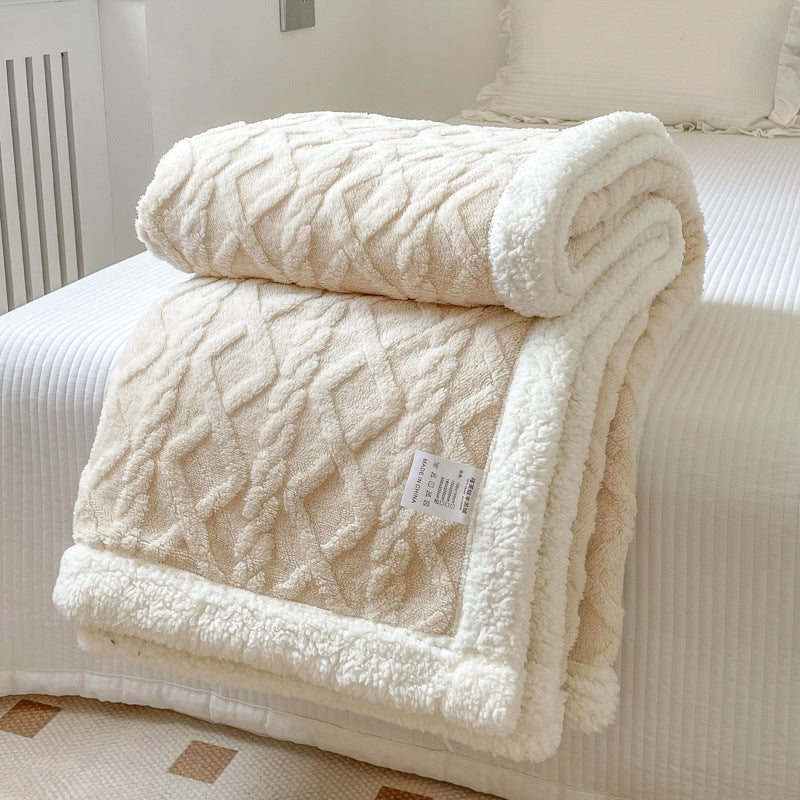 Cable-knit jacquard blanket with sherpa border