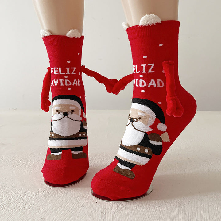 Couple wearing magnetic Christmas socks