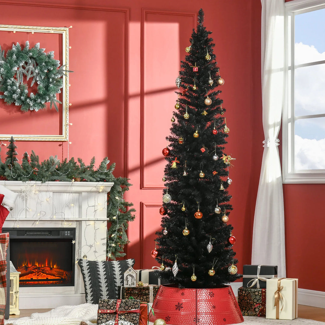Slim black pencil Christmas tree in a living room