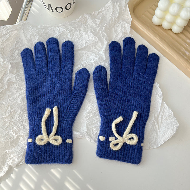 Pink ribbed knit gloves with bow