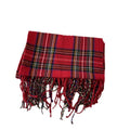 Woman wearing a red tartan scarf