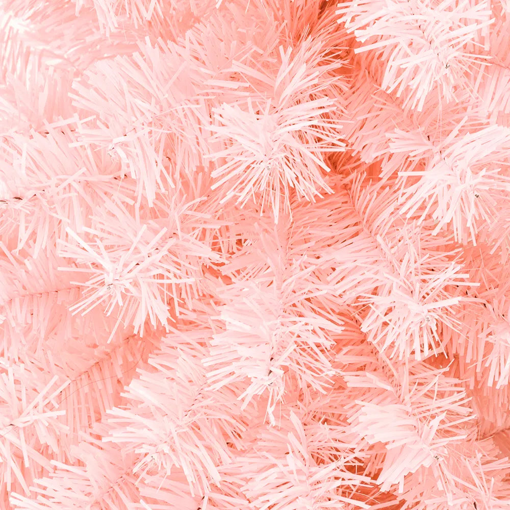 Pink artificial Christmas tree in a living room