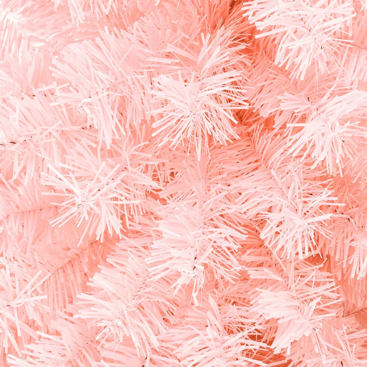 Pink artificial Christmas tree in a living room