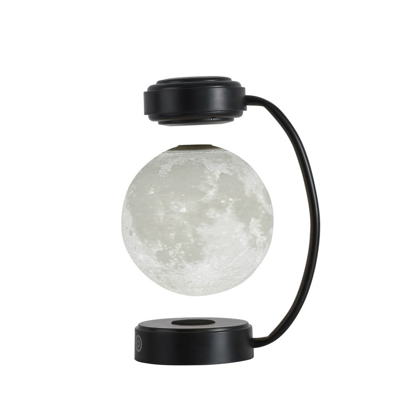 Floating moon lamp under arched holder