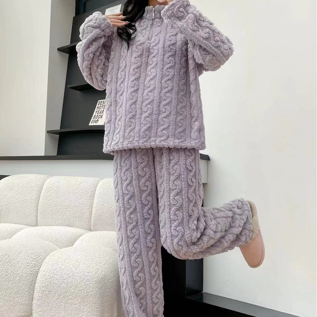Woman in a half-zip fleece pajama set