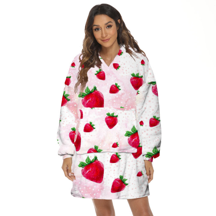 Person wearing oversized hooded blanket