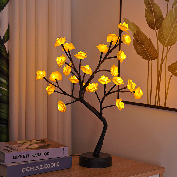 Glowing rose tree lamp on a table