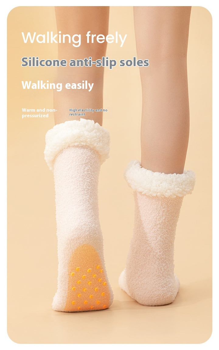 Plush heated socks with a pink deer badge