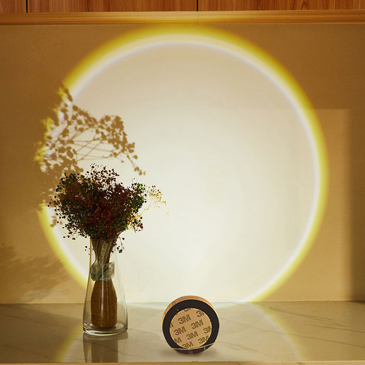 Stick-on push light glowing on a wall