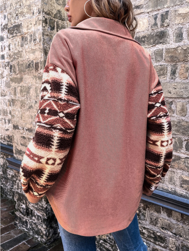 Woman wearing a pink shacket with print sleeves