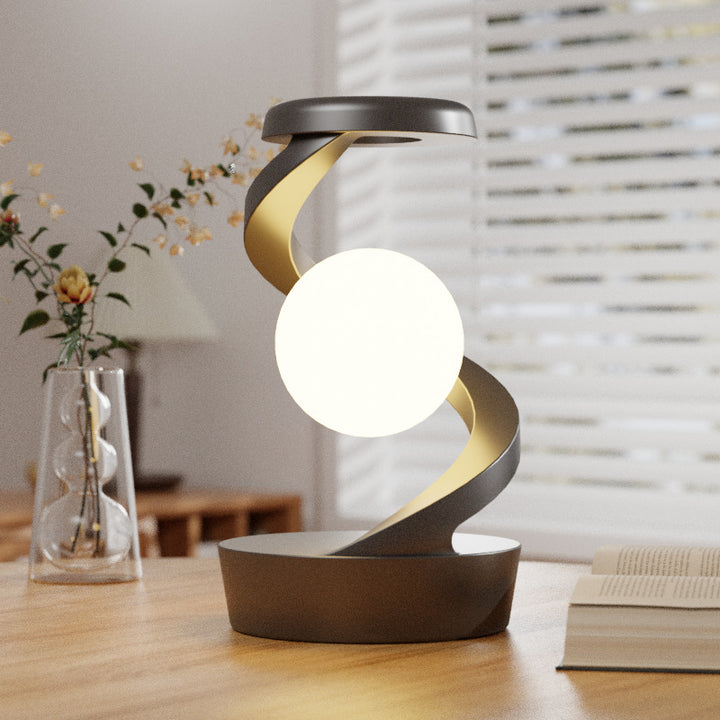 Rotating moon lamp on spiral stand
