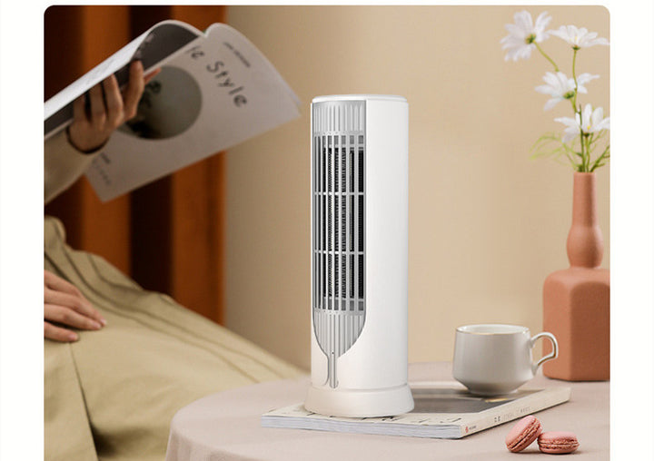 White ceramic tower heater on a desk
