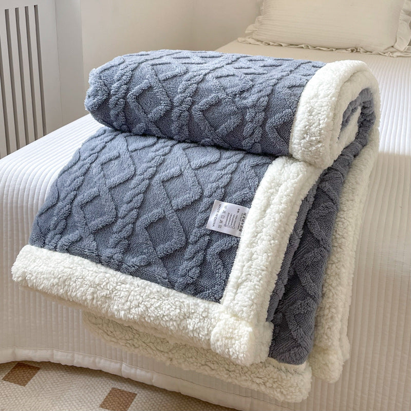 Cable-knit jacquard blanket with sherpa border