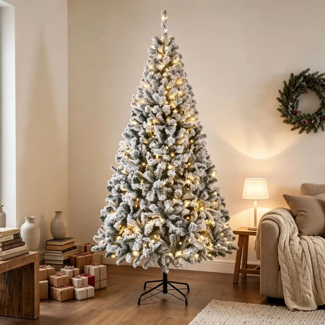 Tall flocked fir Christmas tree with lights