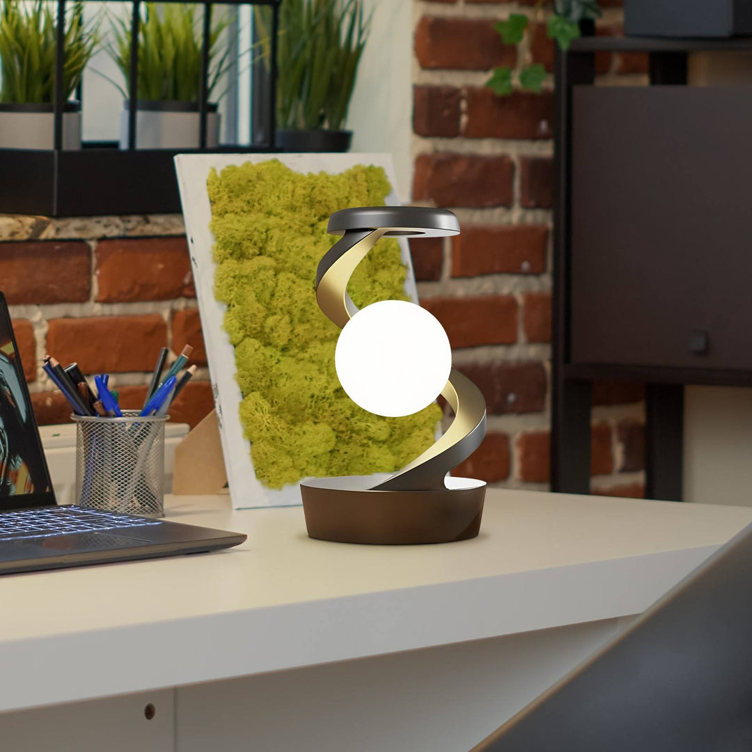Rotating moon lamp on spiral stand
