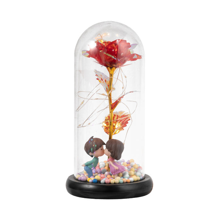 Red eternal rose glowing in glass dome