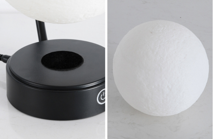 Floating moon lamp under arched holder