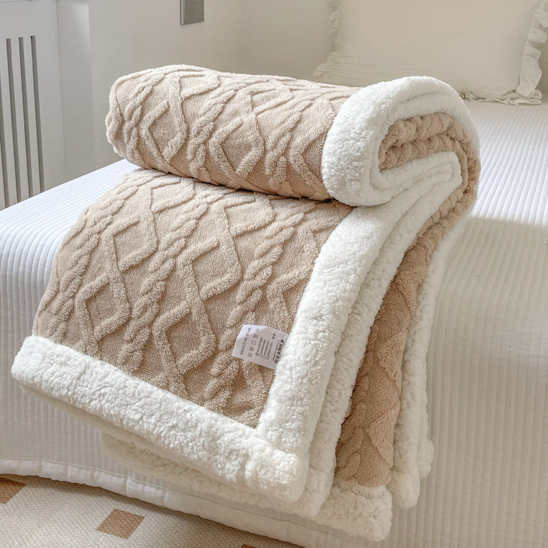 Cable-knit jacquard blanket with sherpa border