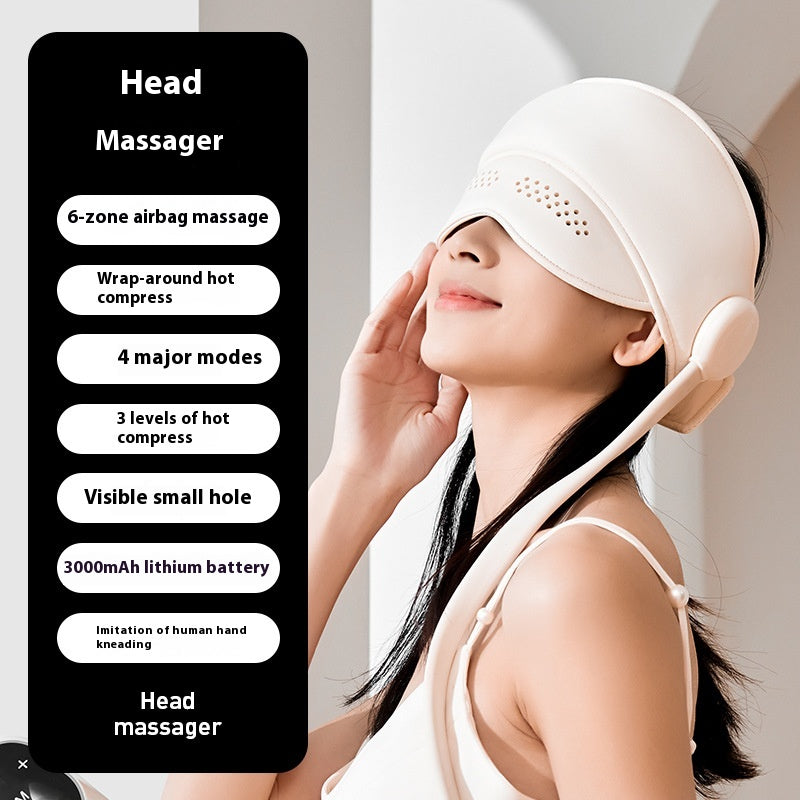 Person wearing a hooded head and eye massager