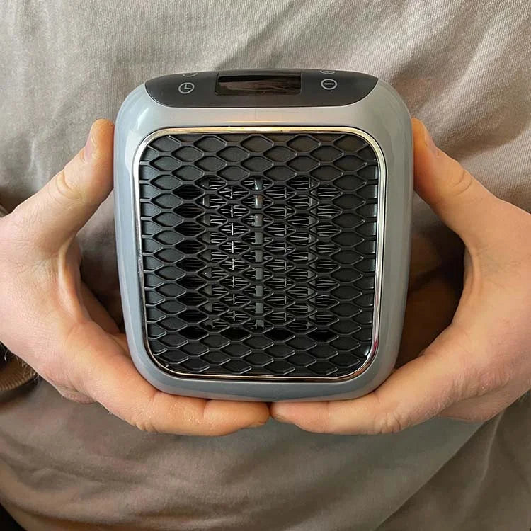Compact portable heating device
