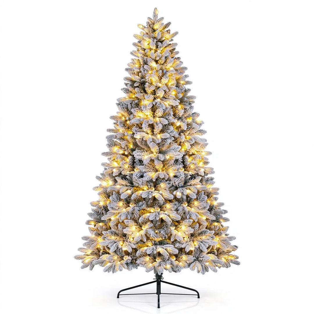 Flocked half Christmas tree against wall