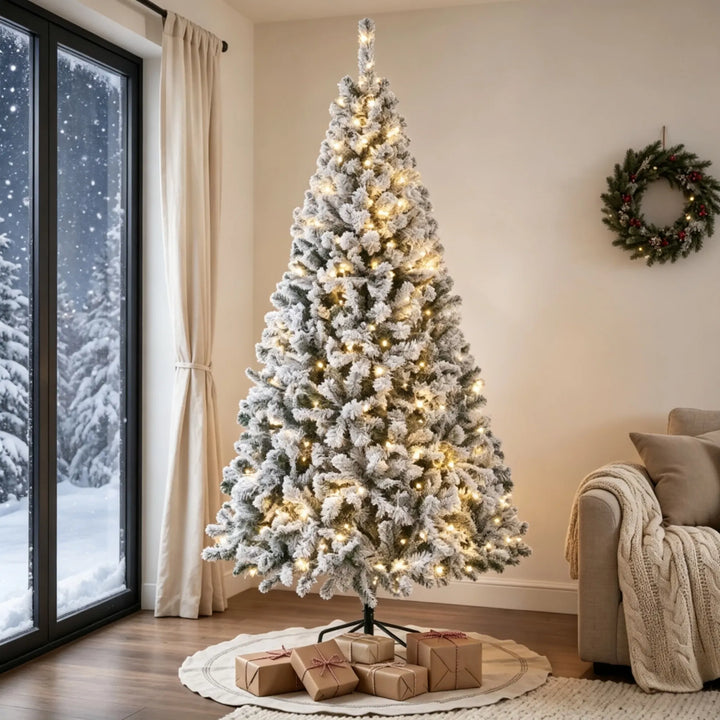 Tall flocked fir Christmas tree with lights