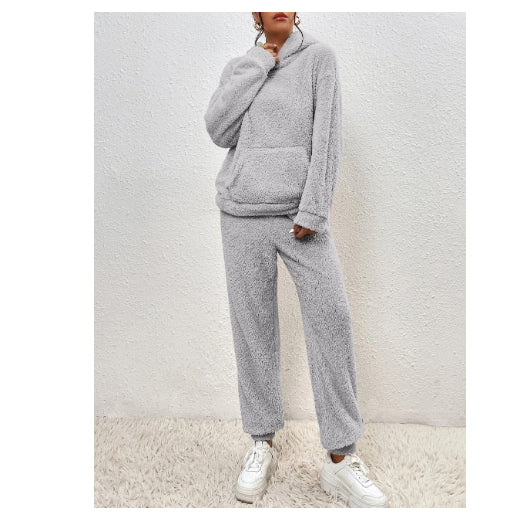 Woman in a fuzzy hoodie lounge set
