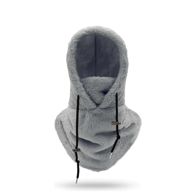 Woman wearing a plush hooded scarf