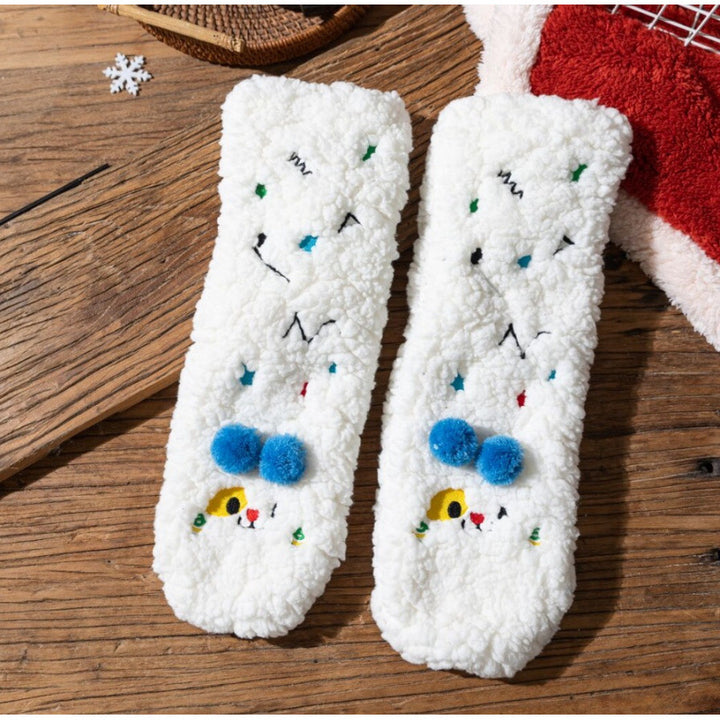 Fluffy pink floor socks with embroidered faces