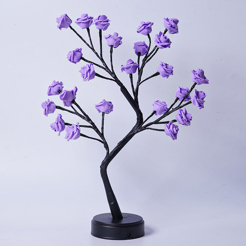 Glowing rose tree lamp on a table