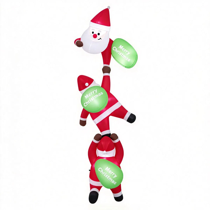 Three inflatable Santas climbing a balcony