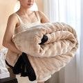 Bubble faux fur blanket with black trim